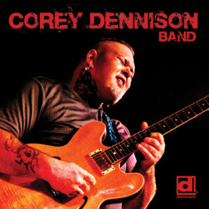 Album Cover - Top Text Says "Corey Dennison Band" Photo of Corey Dennison playing an electric guitar, in bottom right corner is Delmark Logo